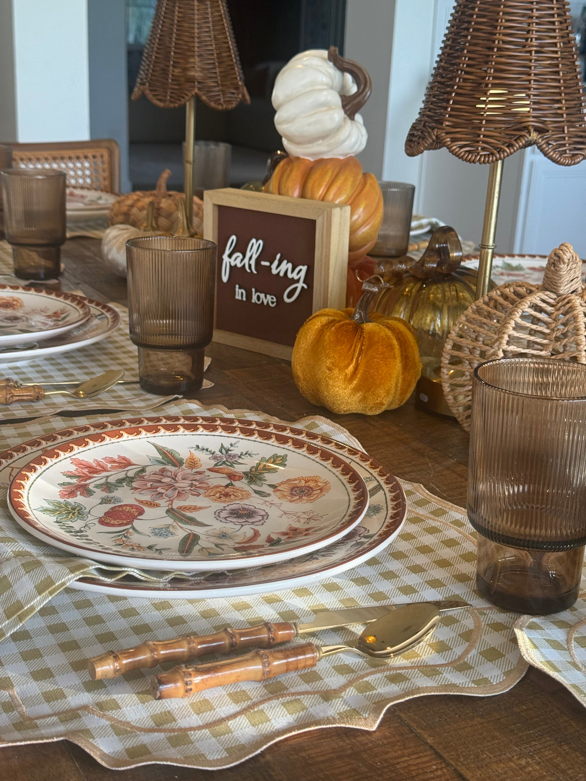 Reversible plaid and white placemat with an embroidered napkin