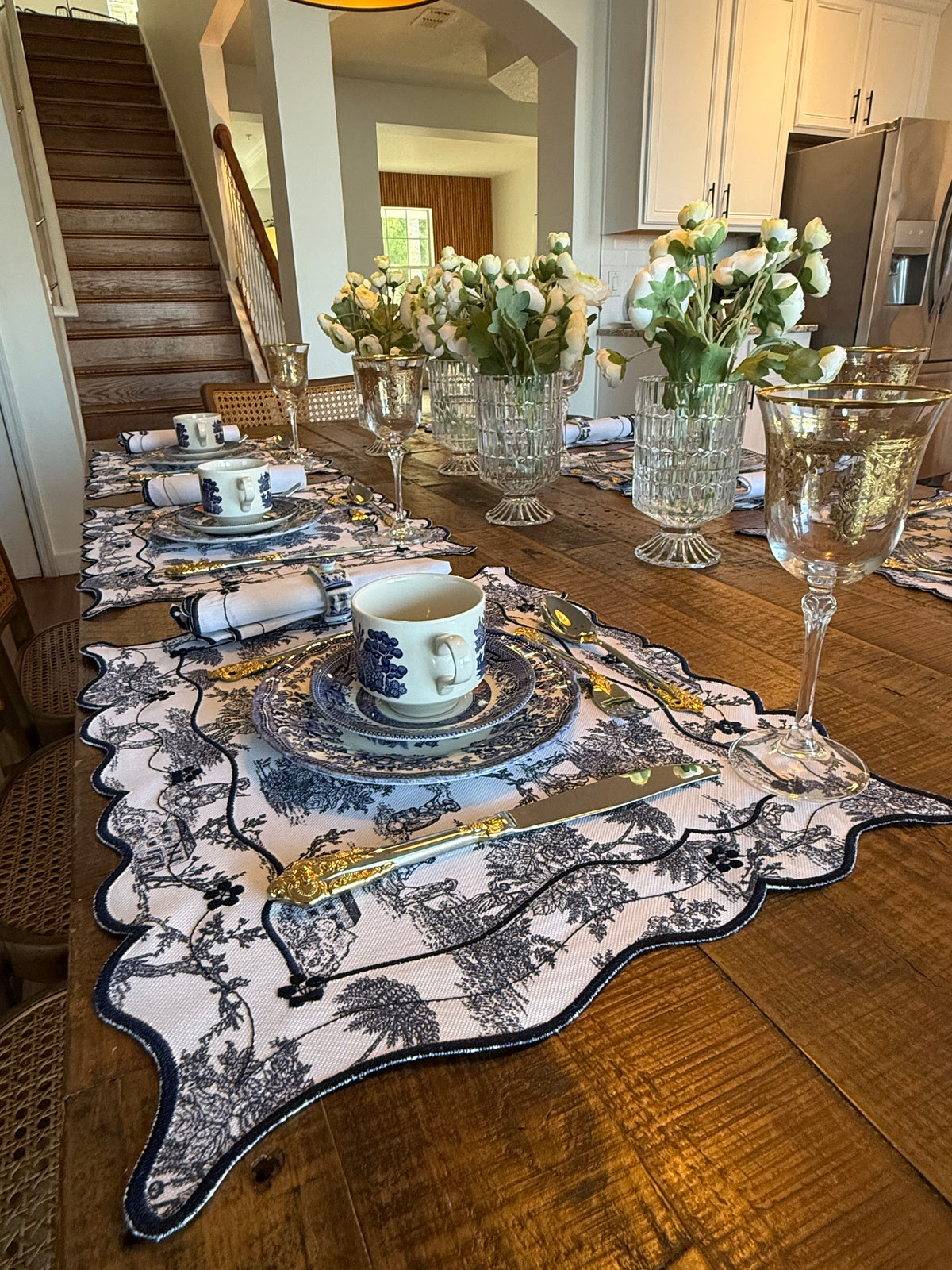 Reversible Toile de Jouy placemat with embroidered napkin.