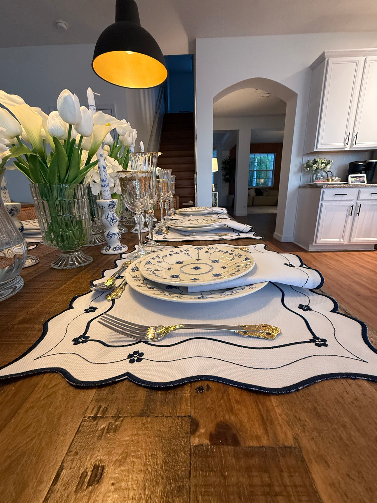 Reversible Toile de Jouy placemat with embroidered napkin.