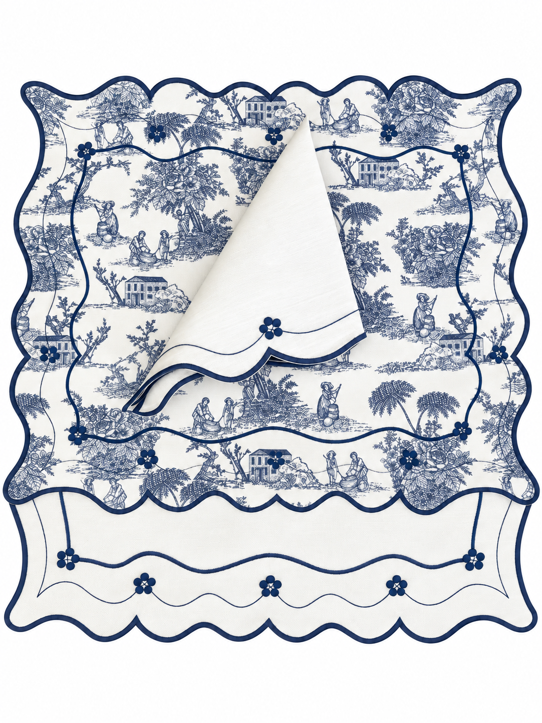 Reversible Toile de Jouy placemat with embroidered napkin.