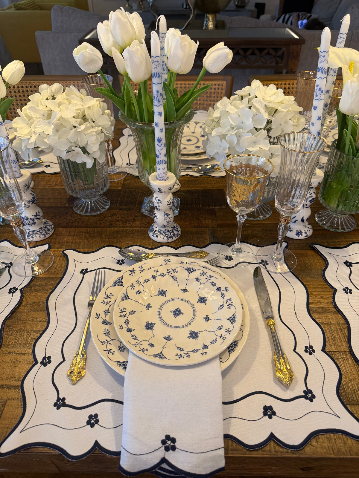 Reversible Toile de Jouy placemat with embroidered napkin.