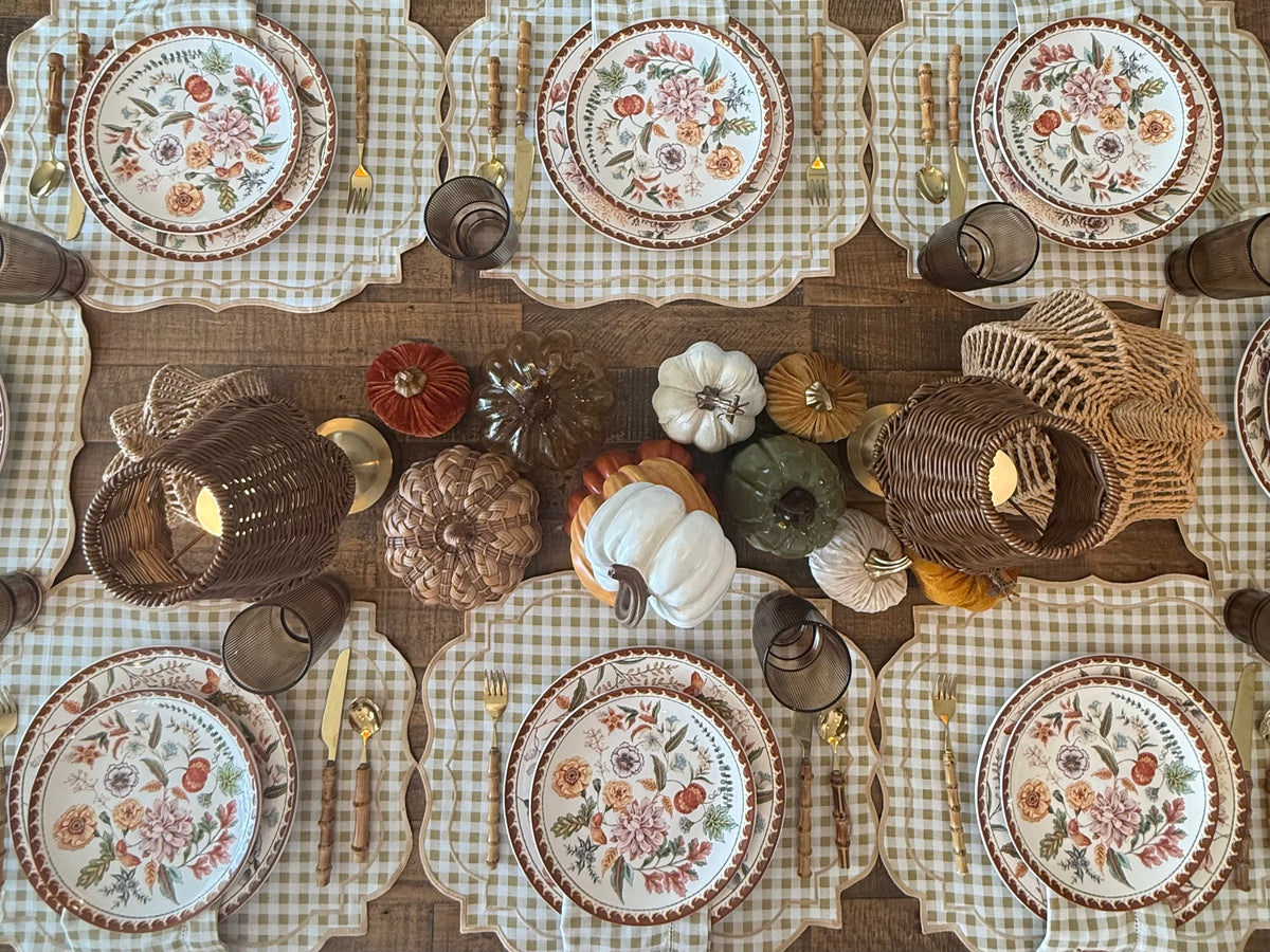 Reversible plaid and white placemat with an embroidered napkin