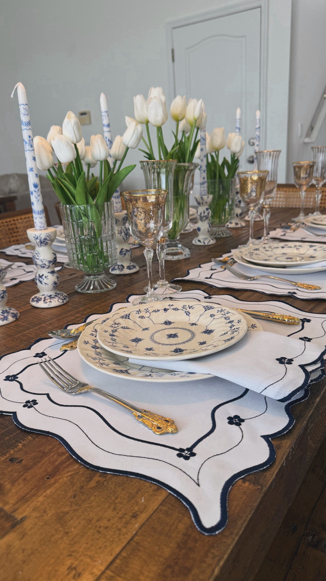 Reversible Toile de Jouy placemat with embroidered napkin.