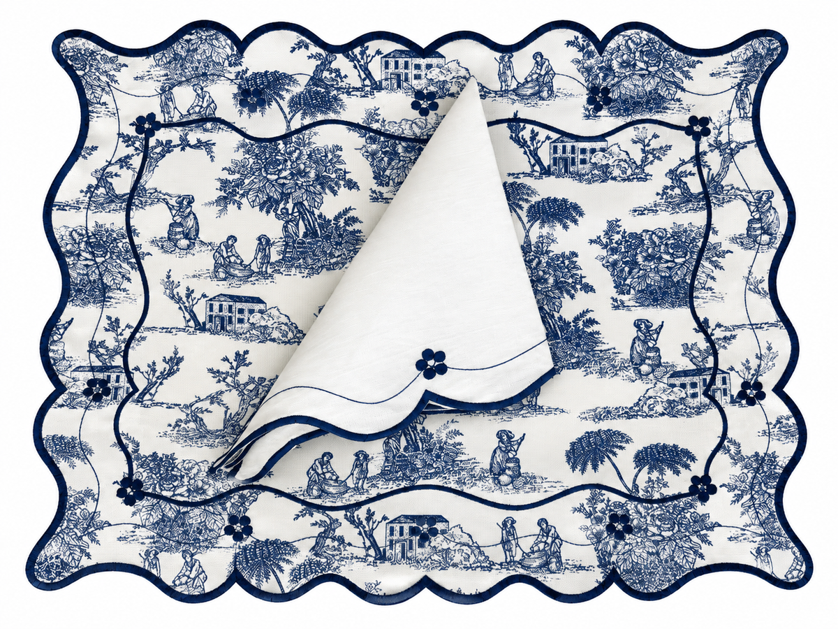 Reversible Toile de Jouy placemat with embroidered napkin.